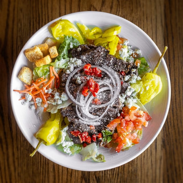 Landing Black & Bleu Salad.